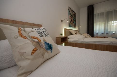 Családi Kikötő Apartmanház55