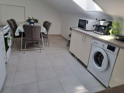 Napsugár Apartman23