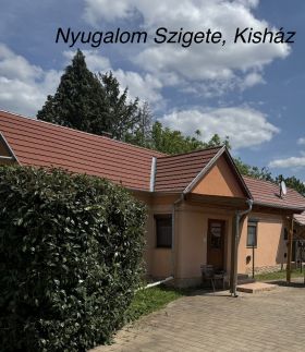 Nyugalom Szigete Kisház
