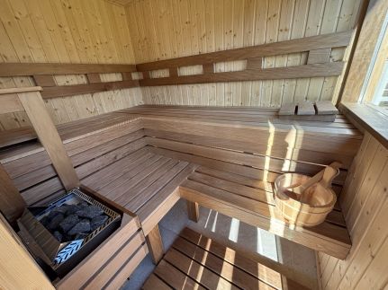 Erdő mellett lebzselő Vendégház21