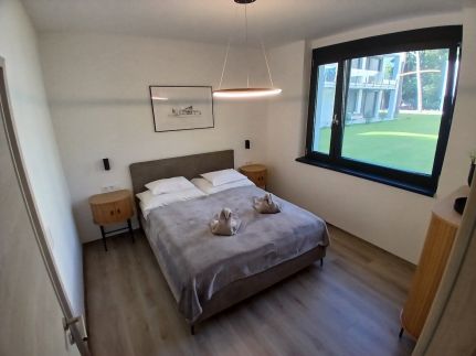 Fenyvesliget Apartmanok 412